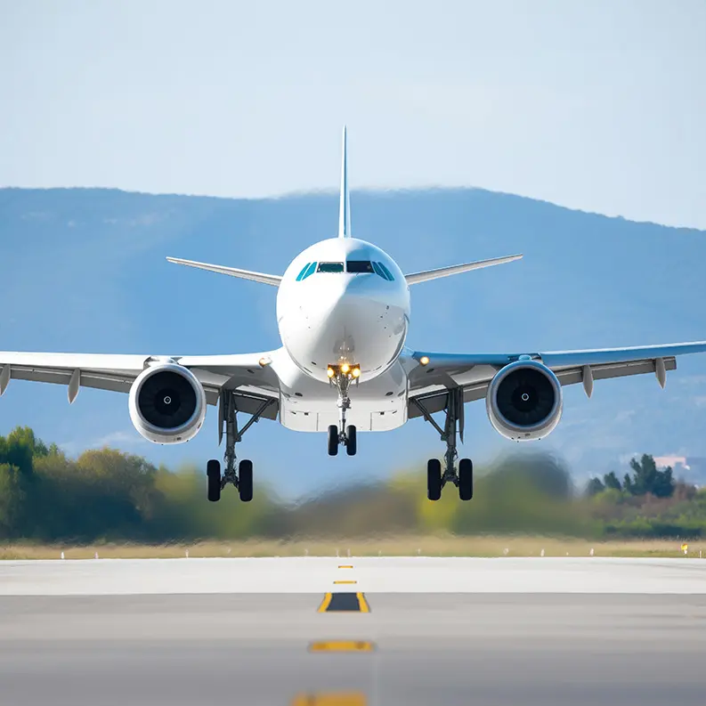Airplane landing on runway scene