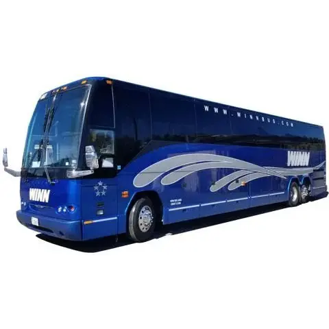 Blue charter bus on road