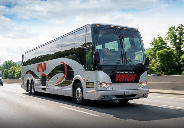 Charter bus driving on highway